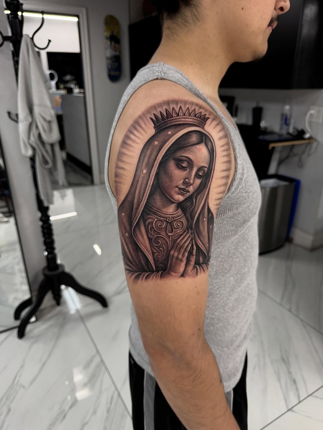 Tattoo by @rtk_tats — realism, black_and_grey