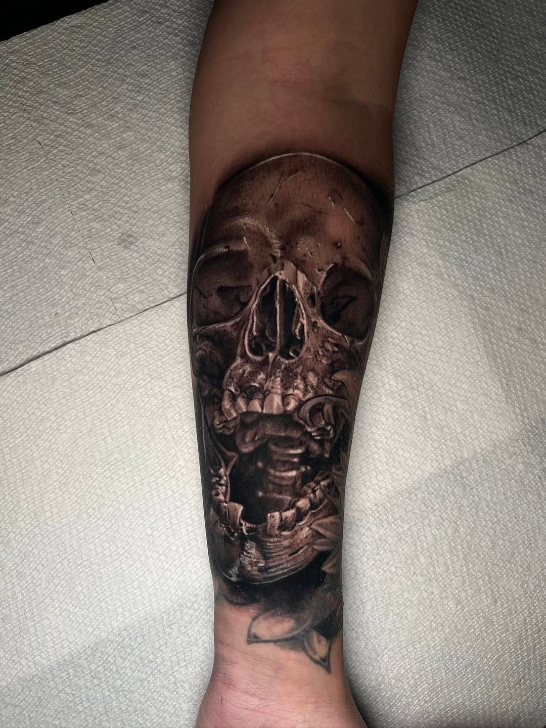 Tattoo by @coreyclarktattoos — realism, black_and_grey