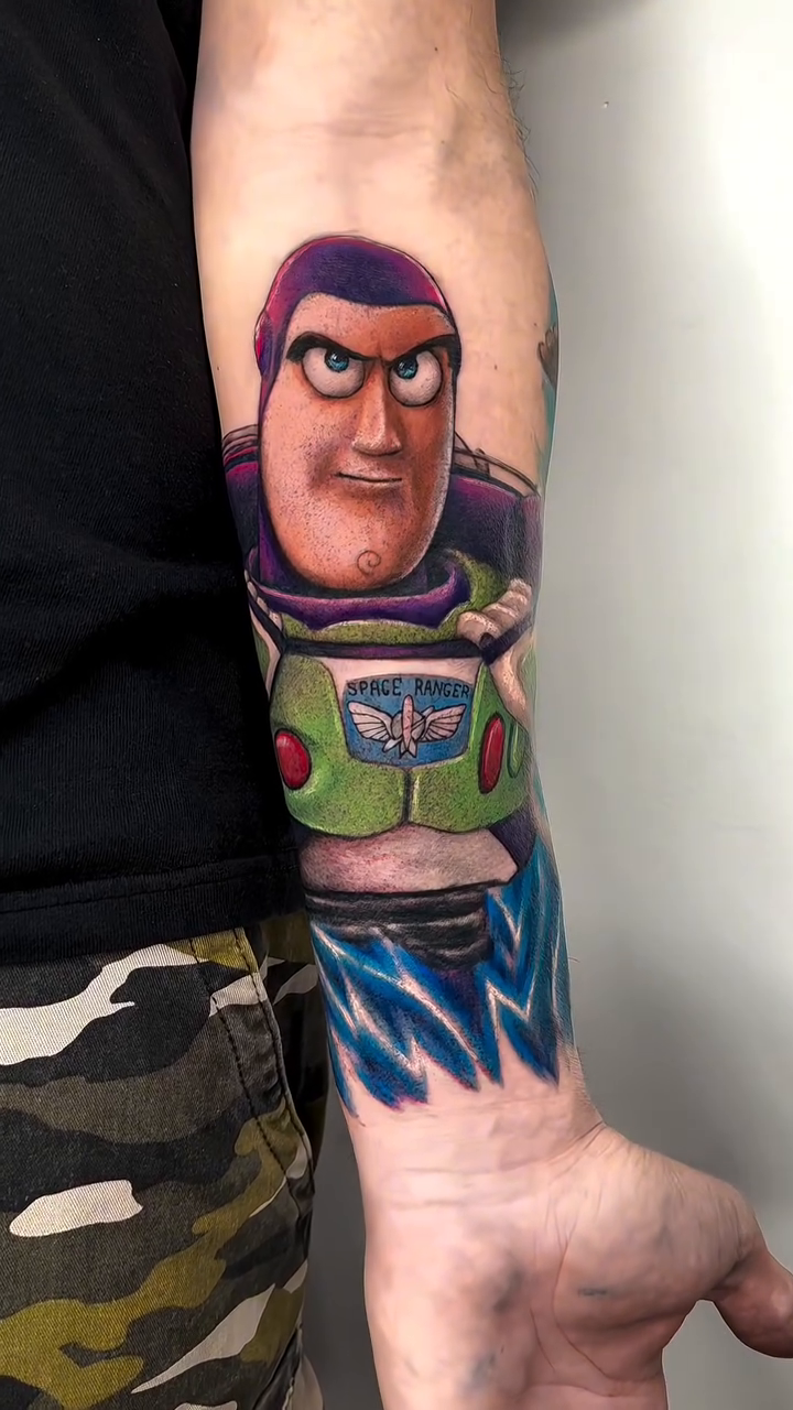 Tattoo by @grin_nyc — realism, anime