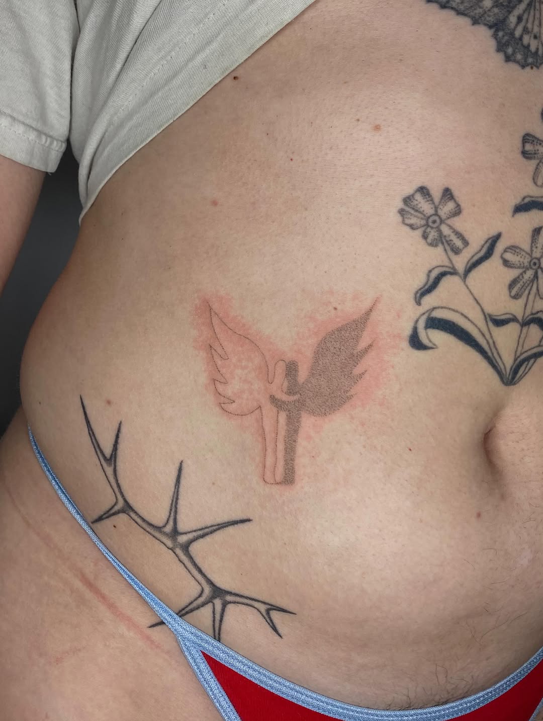 Tattoo by @hot_paws_pokes — dotwork