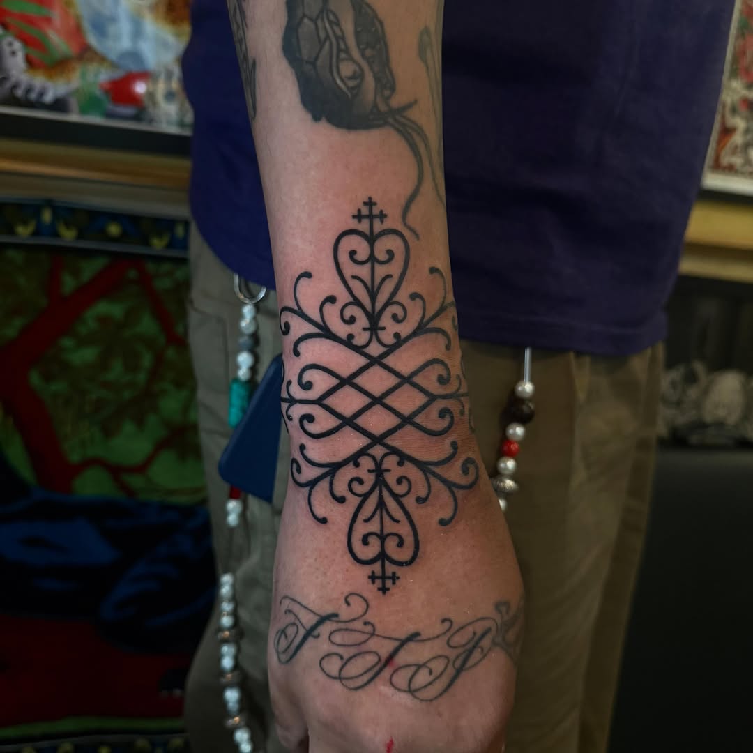 Tattoo by @dojatatt — ornamental, blackwork
