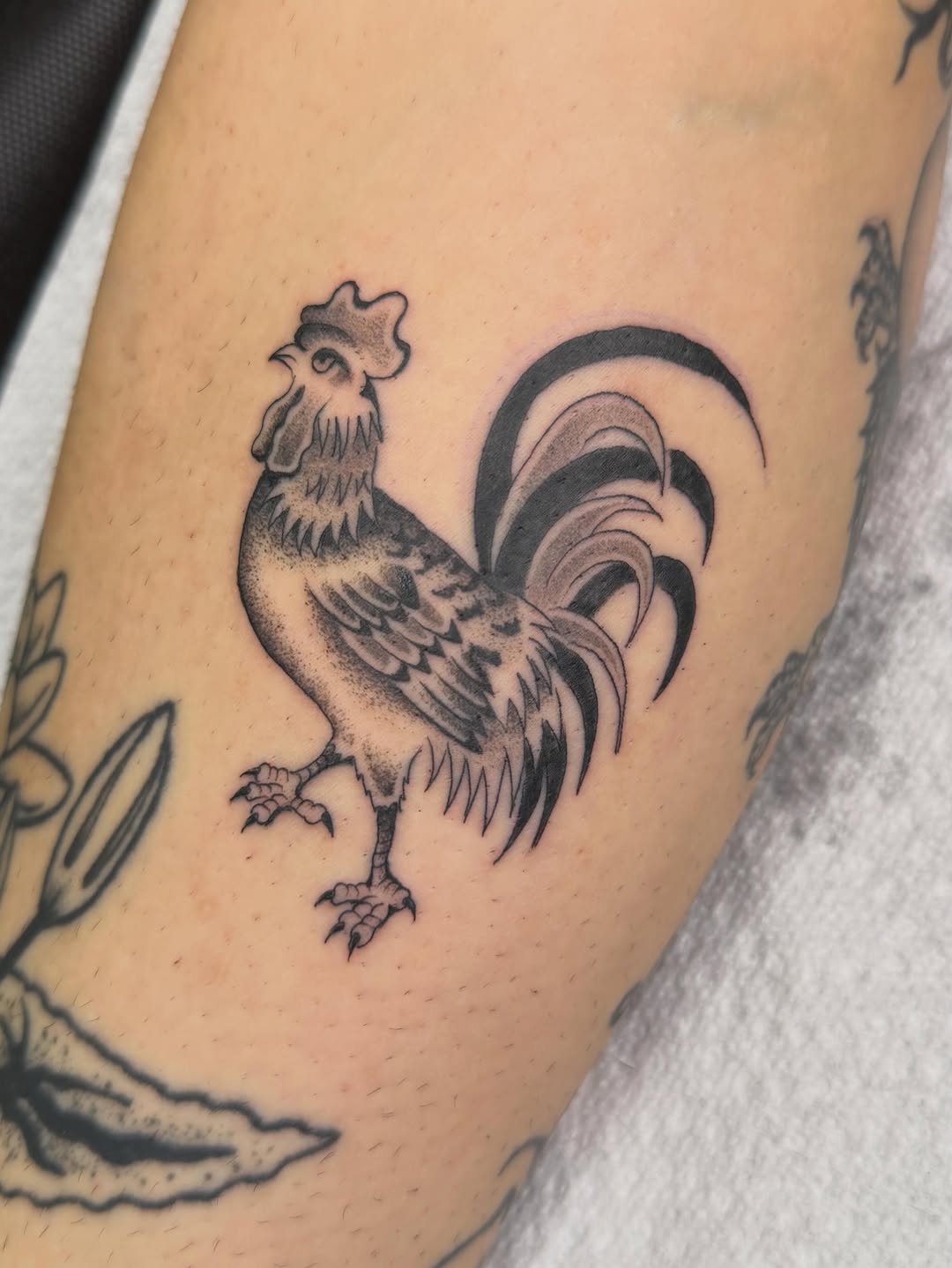 Tattoo by @rinoski.tattoo — black_and_grey, illustrative
