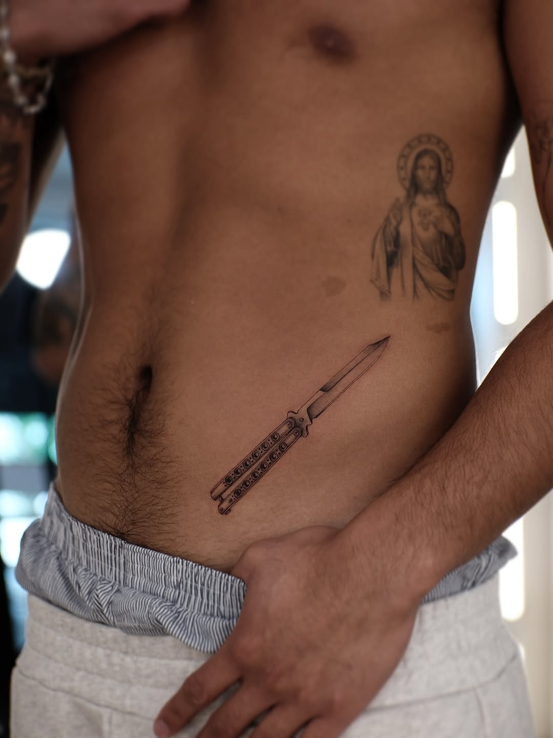 Tattoo by @zeke.tattoo — realism, black_and_grey