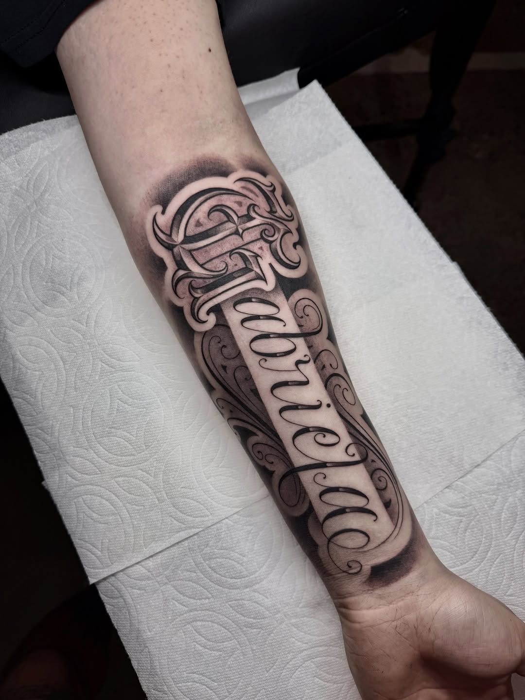 Tattoo by @marcusmartineztattoo β lettering_script, black_and_grey