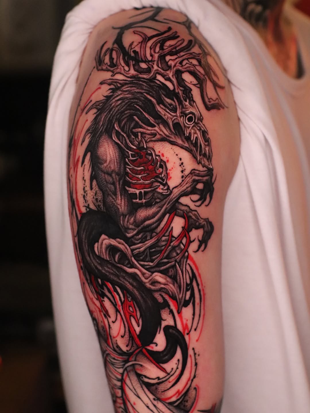 Tattoo by @tattooist_twoface — dark_realism, blackwork