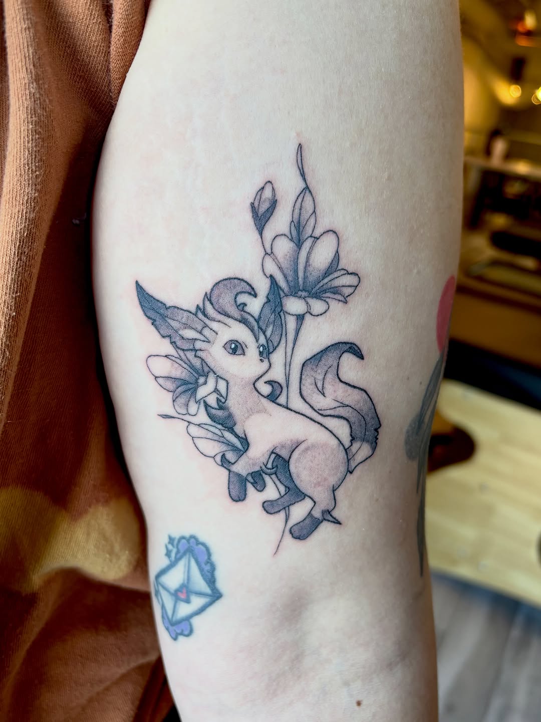 Tattoo by @tats_by_bcatt — illustrative, anime