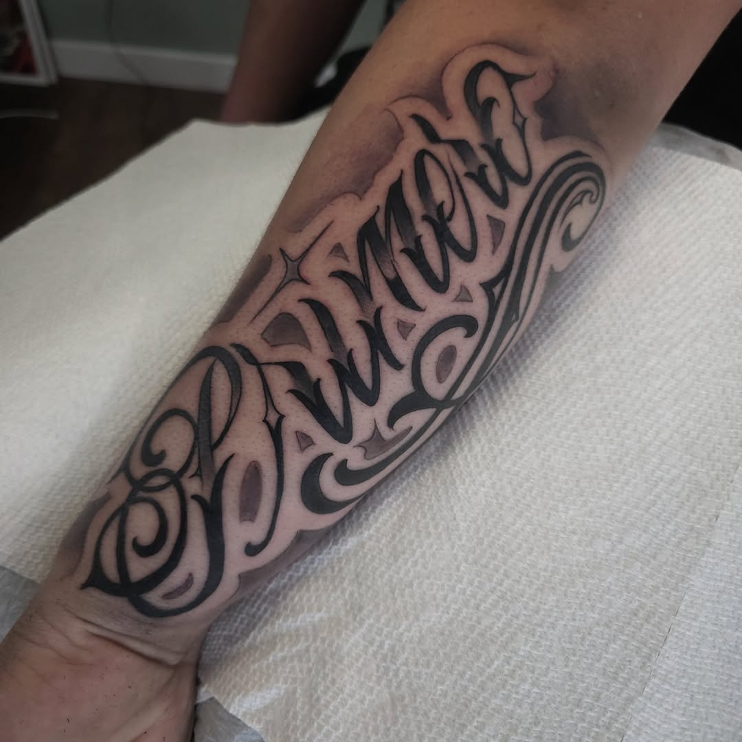 Tattoo by @jballardtattoos — lettering_script, chicano