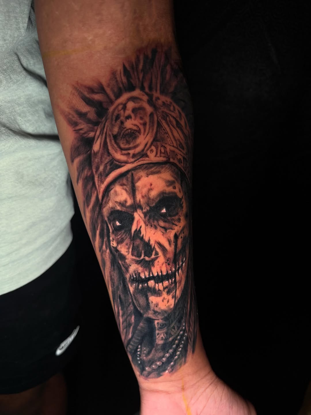 Tattoo by @skunk_punk_ink — realism, black_and_grey