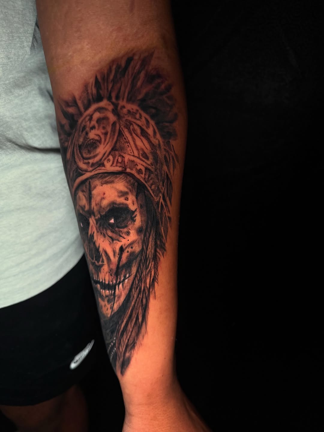 Tattoo by @skunk_punk_ink — realism, black_and_grey