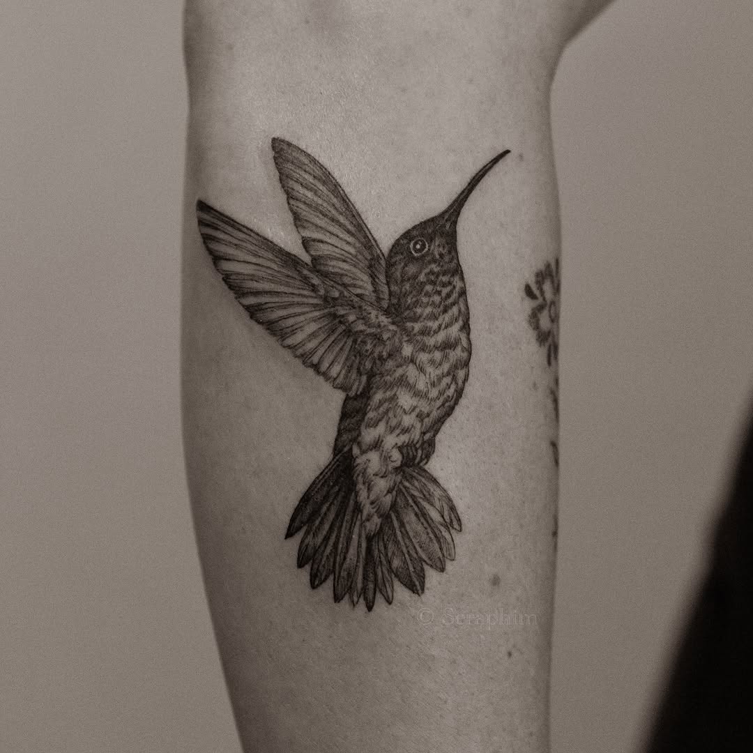 Tattoo by @seraphim.fineline — realism, black_and_grey