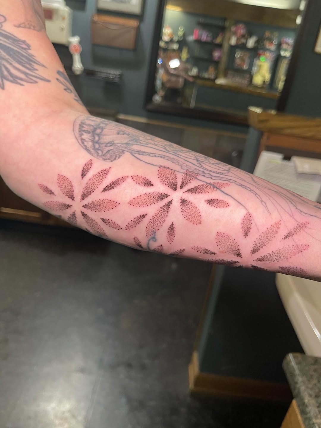 Tattoo by @jellyrat_tatts — dotwork, geometric