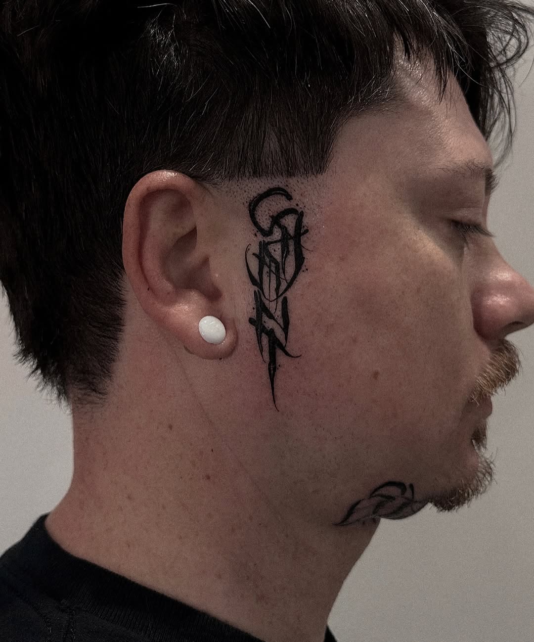 Tattoo by @marina_tats โ lettering_script, blackwork