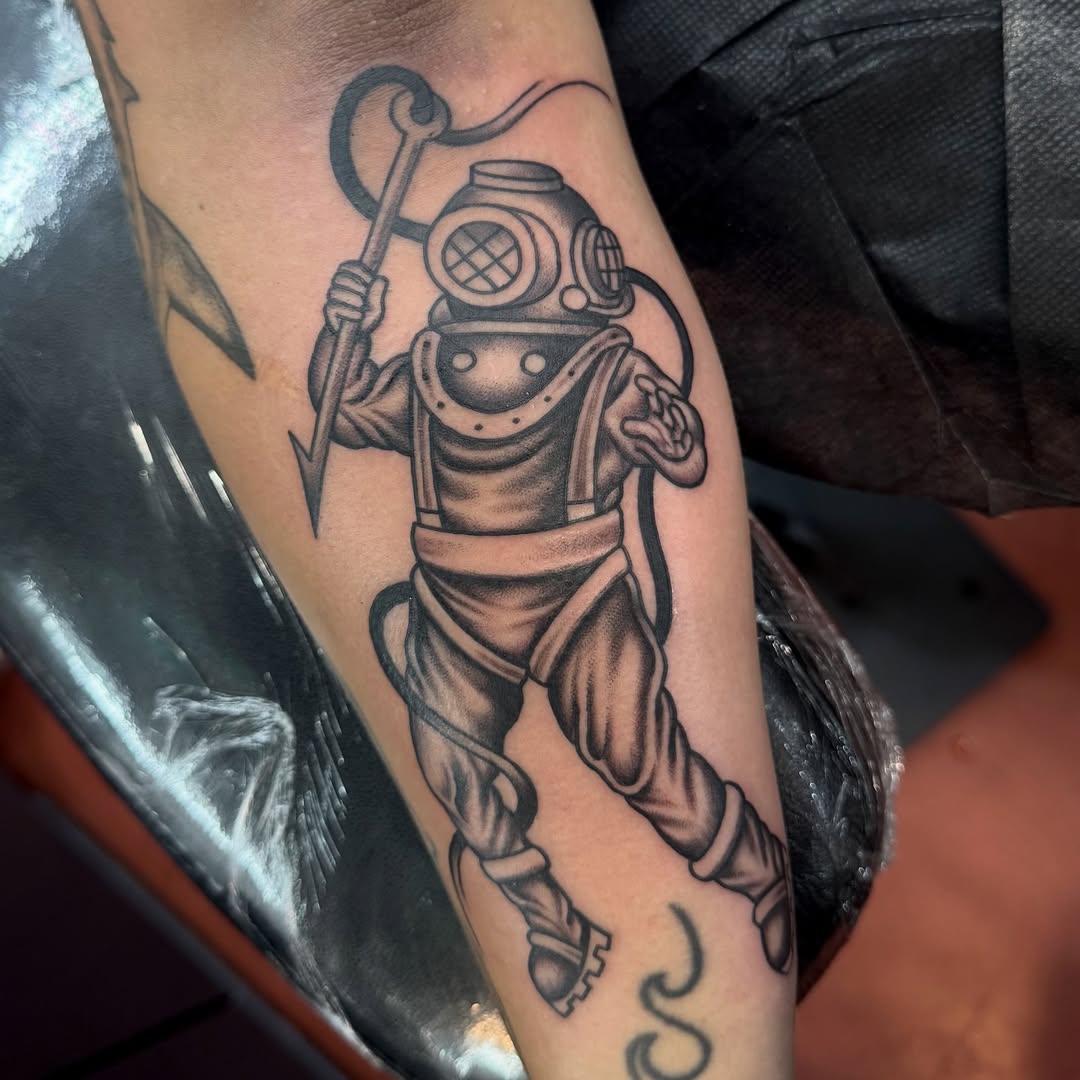 Tattoo by @ernie_portcity — black_and_grey, realism