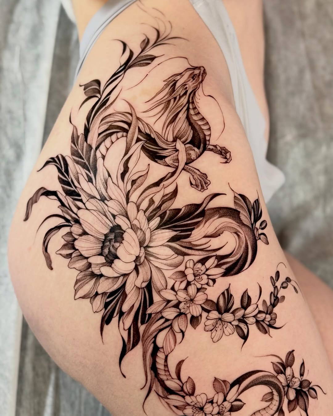 Tattoo by @aarchitattoo — black_and_grey, realism