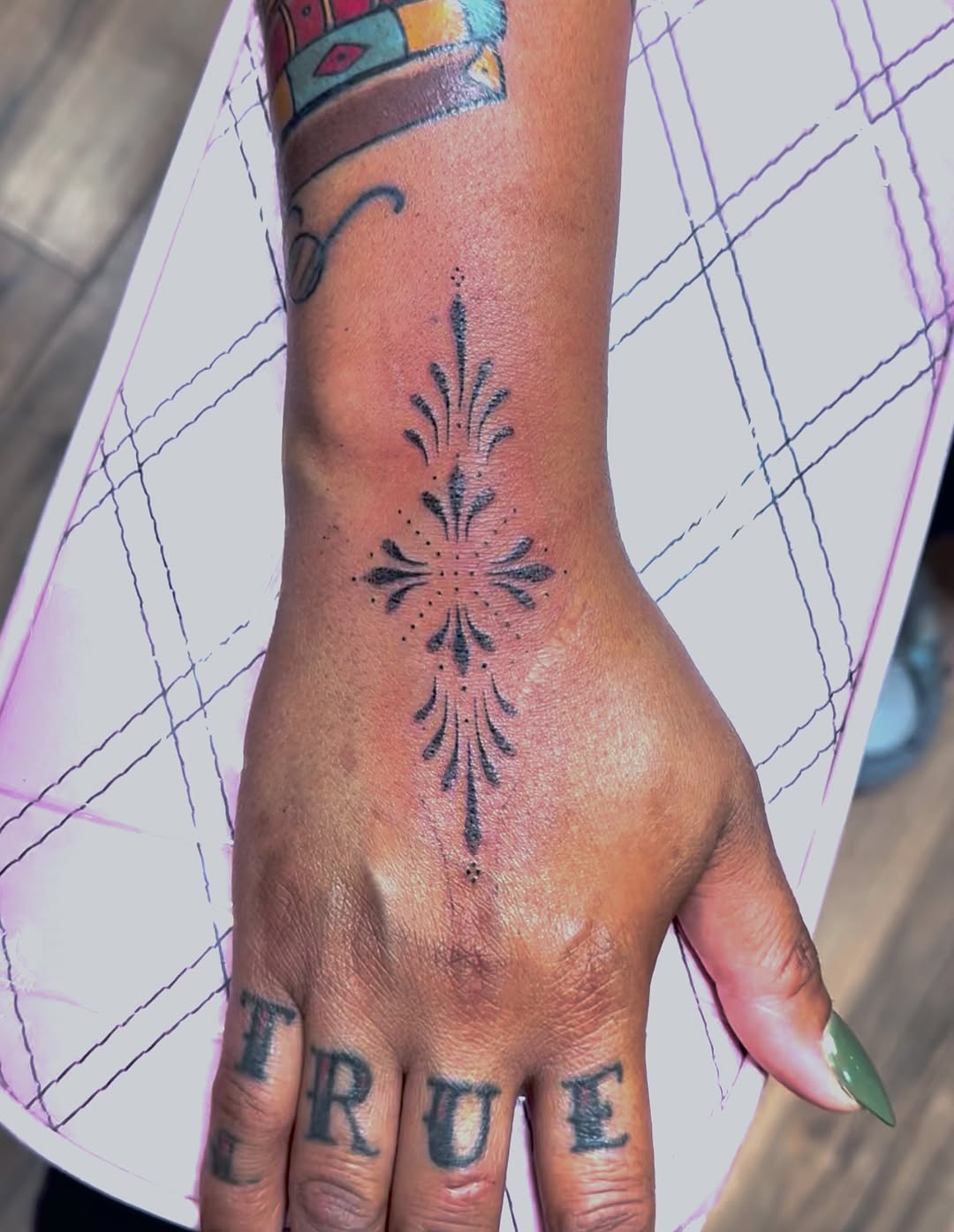 Tattoo by @queenieink โ fine_line, dotwork