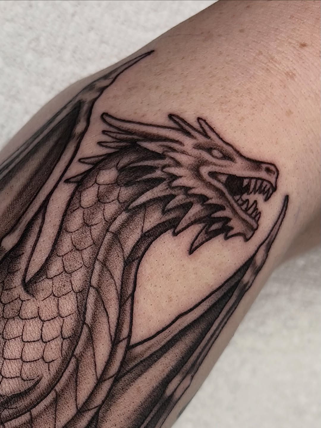 Tattoo by @corn.on.the.jacob — black_and_grey, realism
