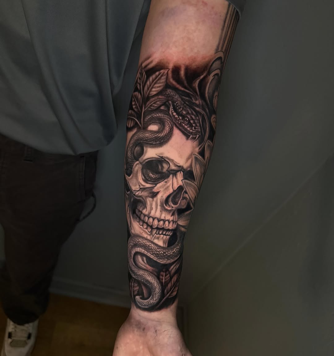Tattoo by @burkes.body.graphic — realism, black_and_grey