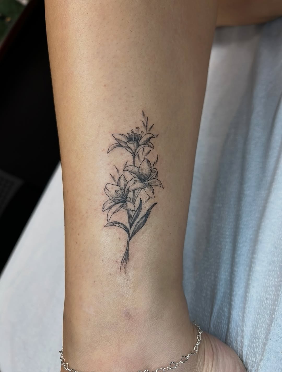 Tattoo by @saber_tooth_tattoo โ fine_line, black_and_grey