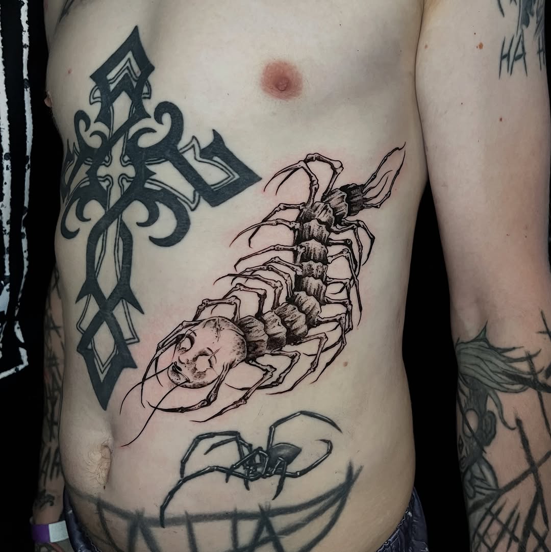 Tattoo by @tattoosbycameronj — black_and_grey, dark_realism