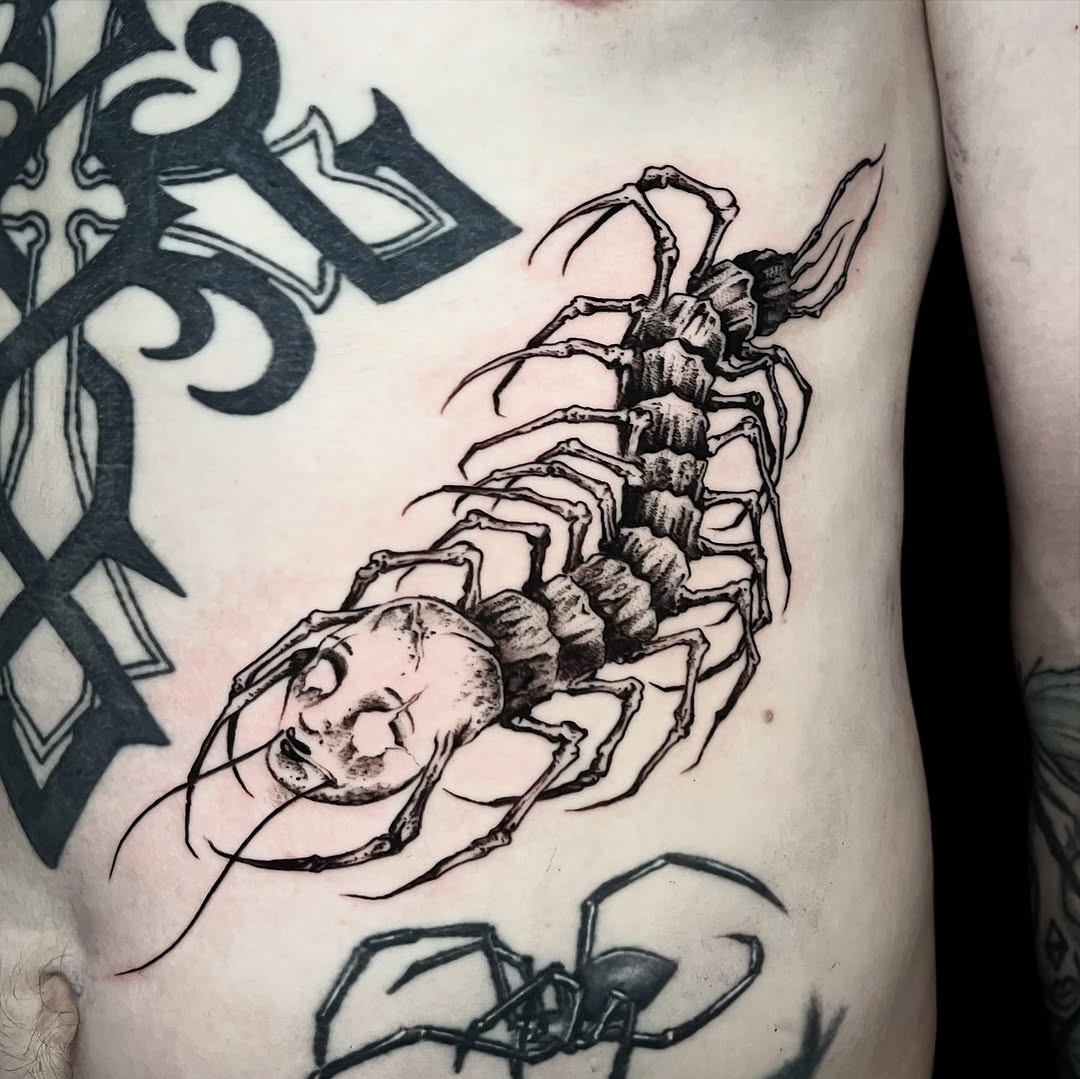 Tattoo by @tattoosbycameronj — dark_realism, blackwork