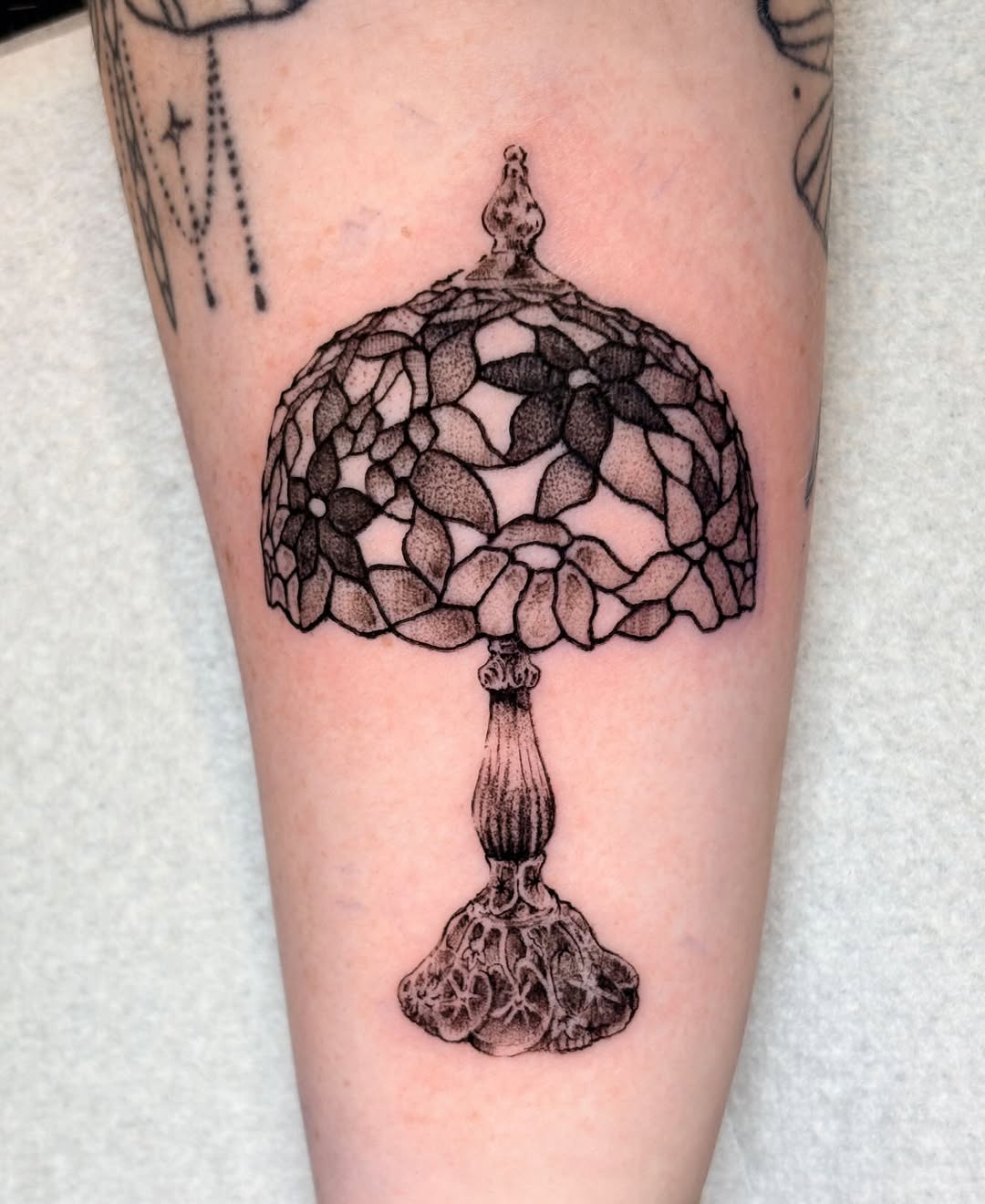 Tattoo by @frogtatz — illustrative, dotwork