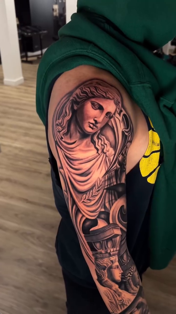 Tattoo by @mkv.ink — black_and_grey, realism