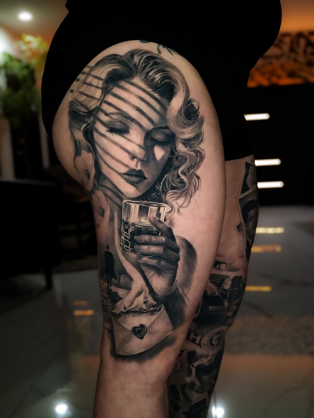 Tattoo by @angel.antonio.tattoos โ realism, black_and_grey