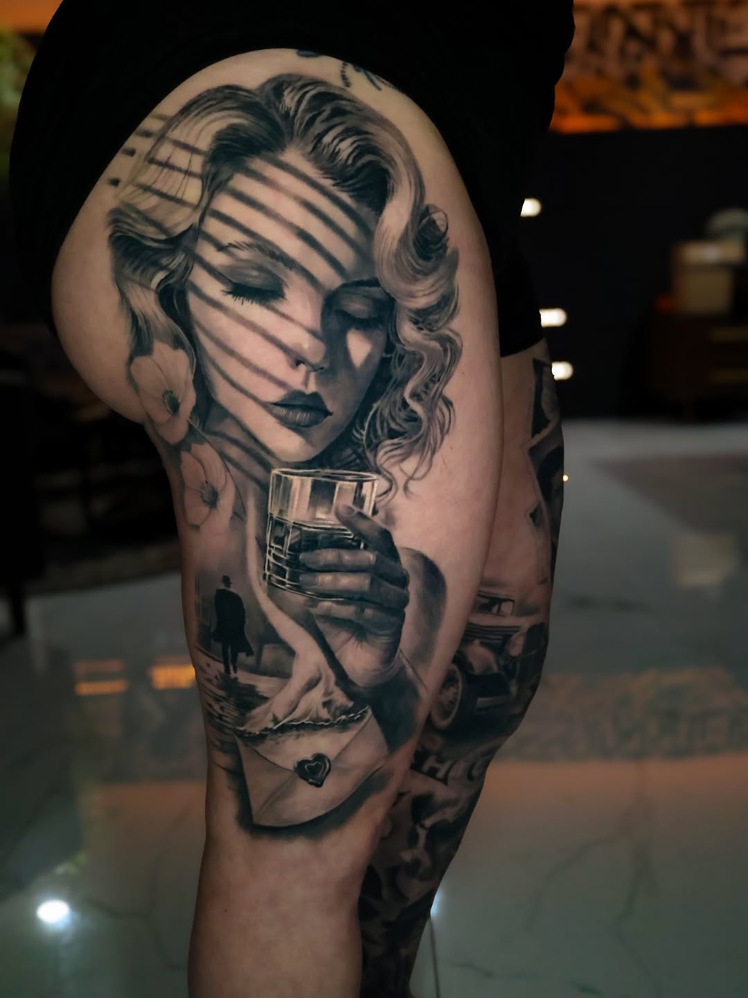 Tattoo by @angel.antonio.tattoos โ realism, black_and_grey