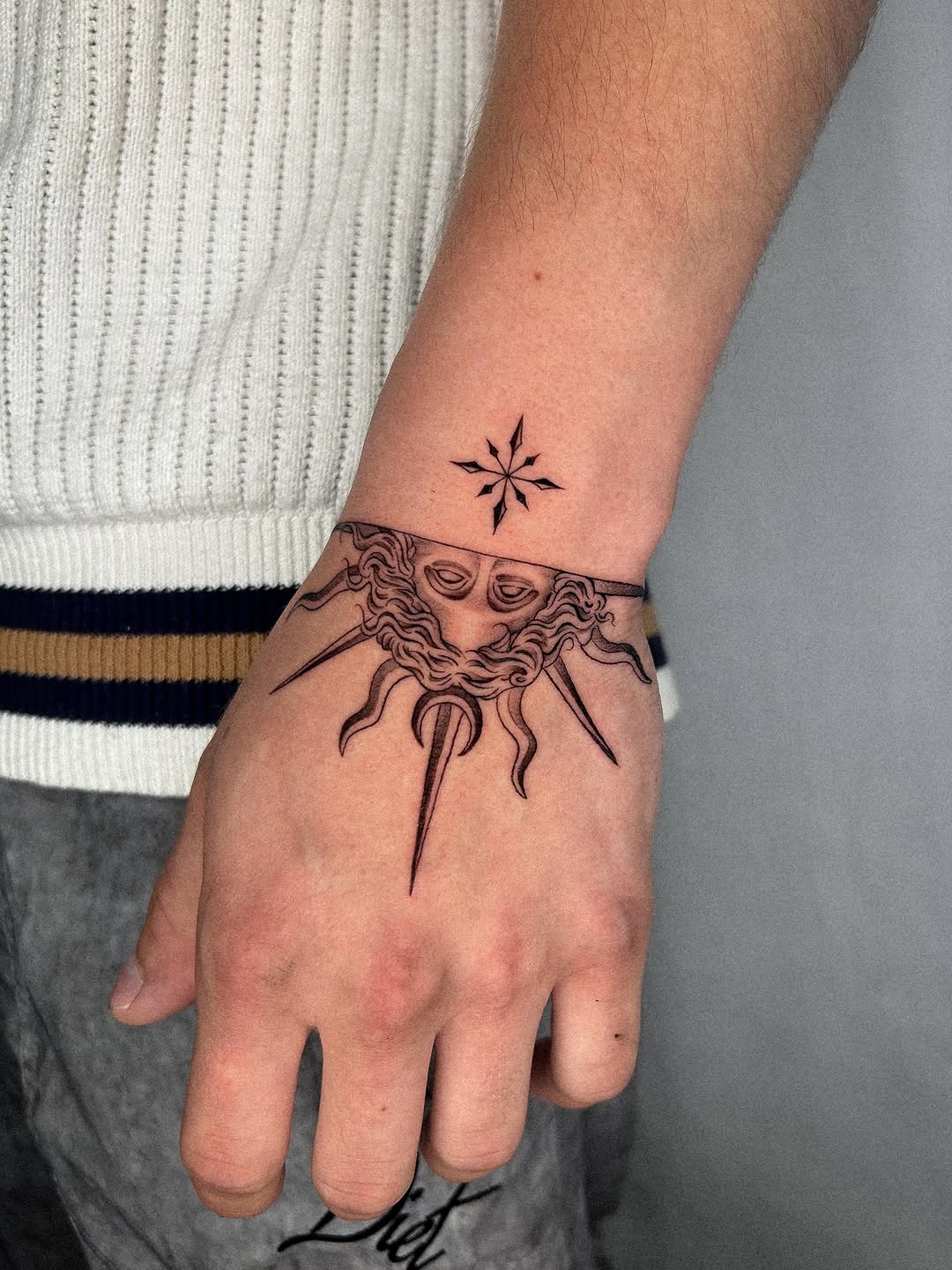 Tattoo by @kevin.tatt — fine_line, black_and_grey