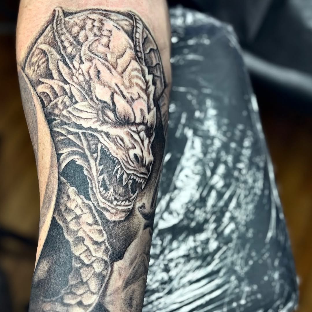 Tattoo by @koolzink — realism, black_and_grey