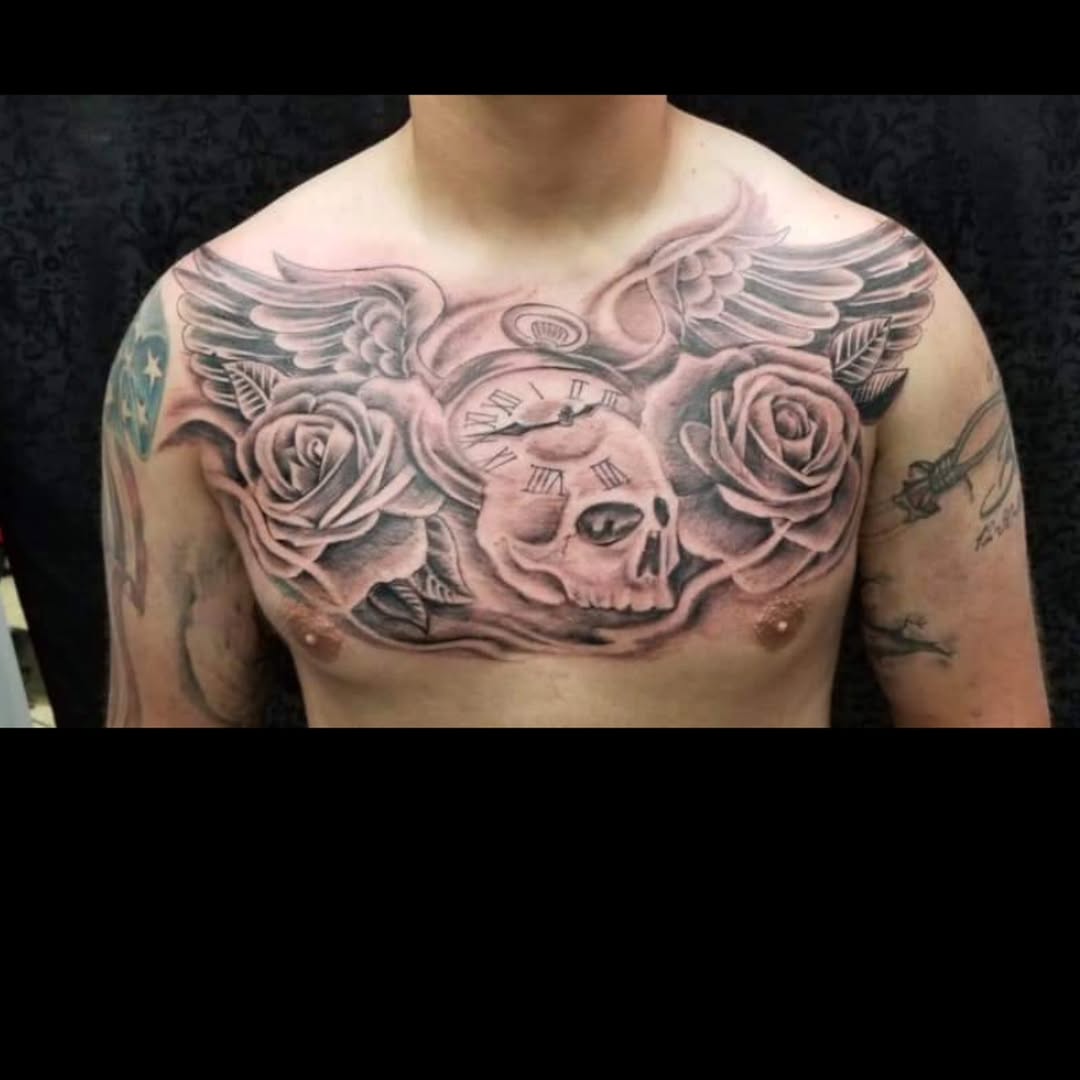 Tattoo by @tattoodennis76 — realism, black_and_grey