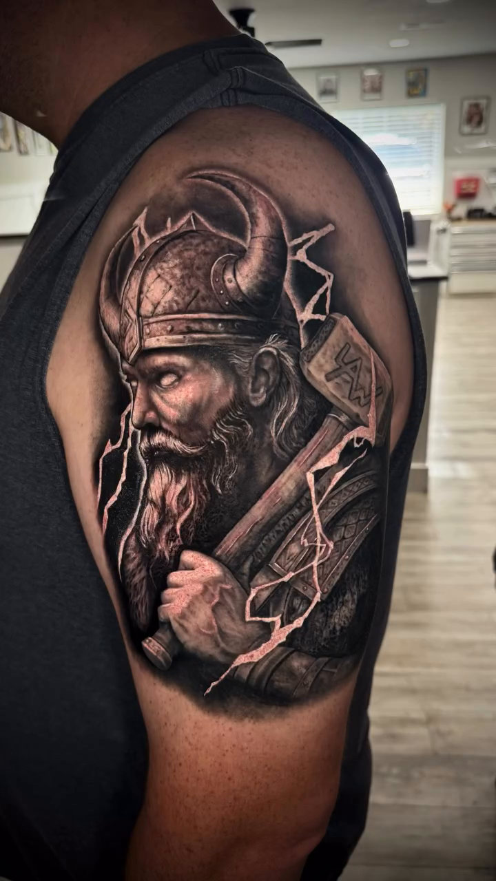 Tattoo by @stabby.dan — realism, black_and_grey