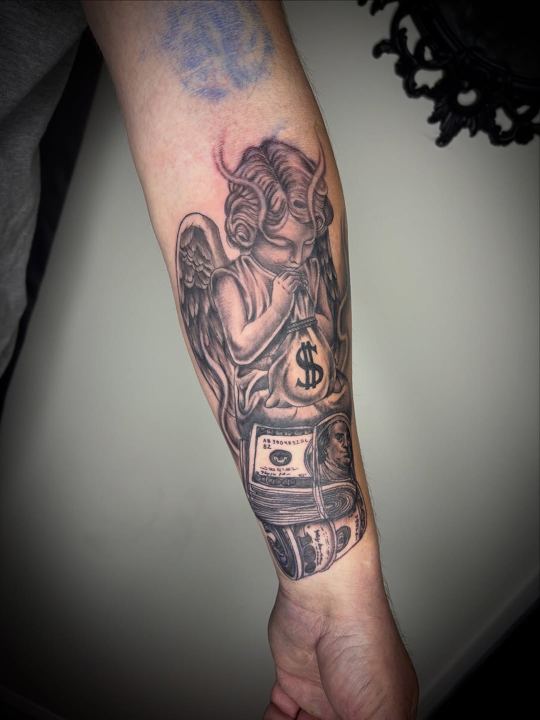 Tattoo by @zhentats2 β realism, black_and_grey