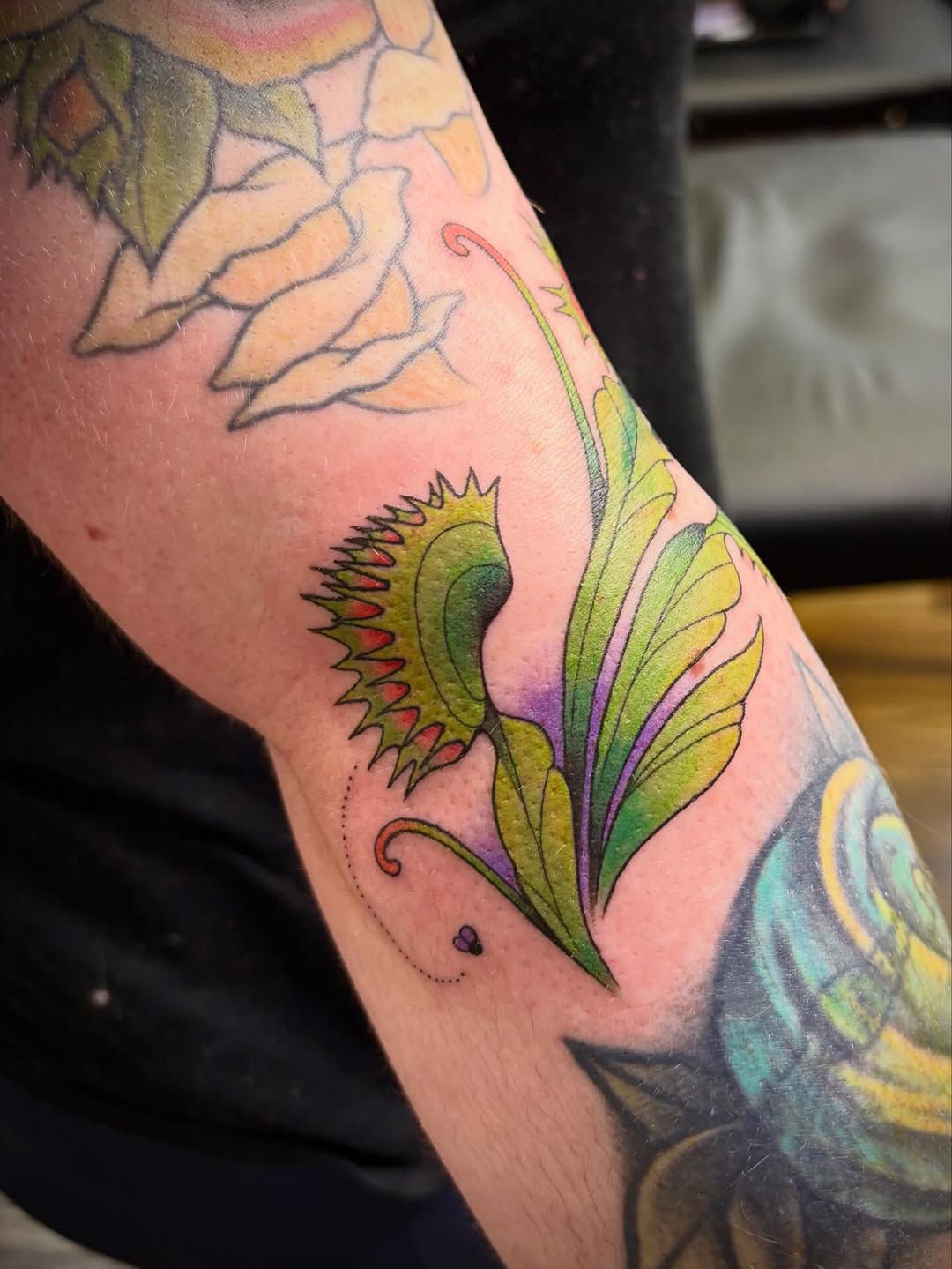Tattoo by @harmo.ink — illustrative, color