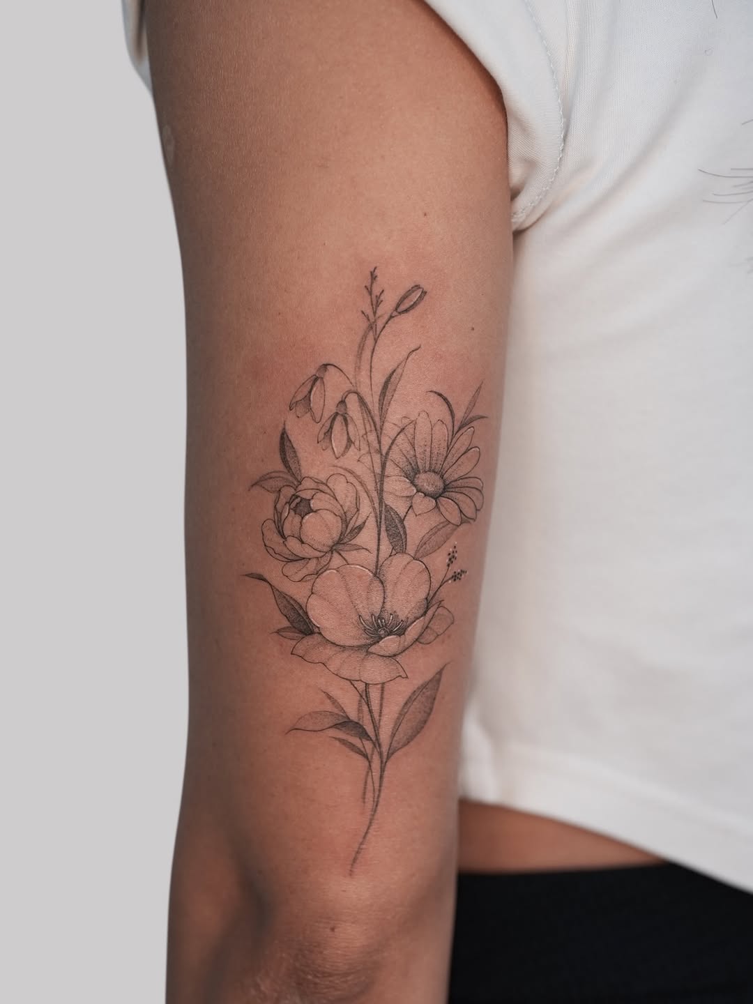 Tattoo by @xiu.tattoos — fine_line, black_and_grey