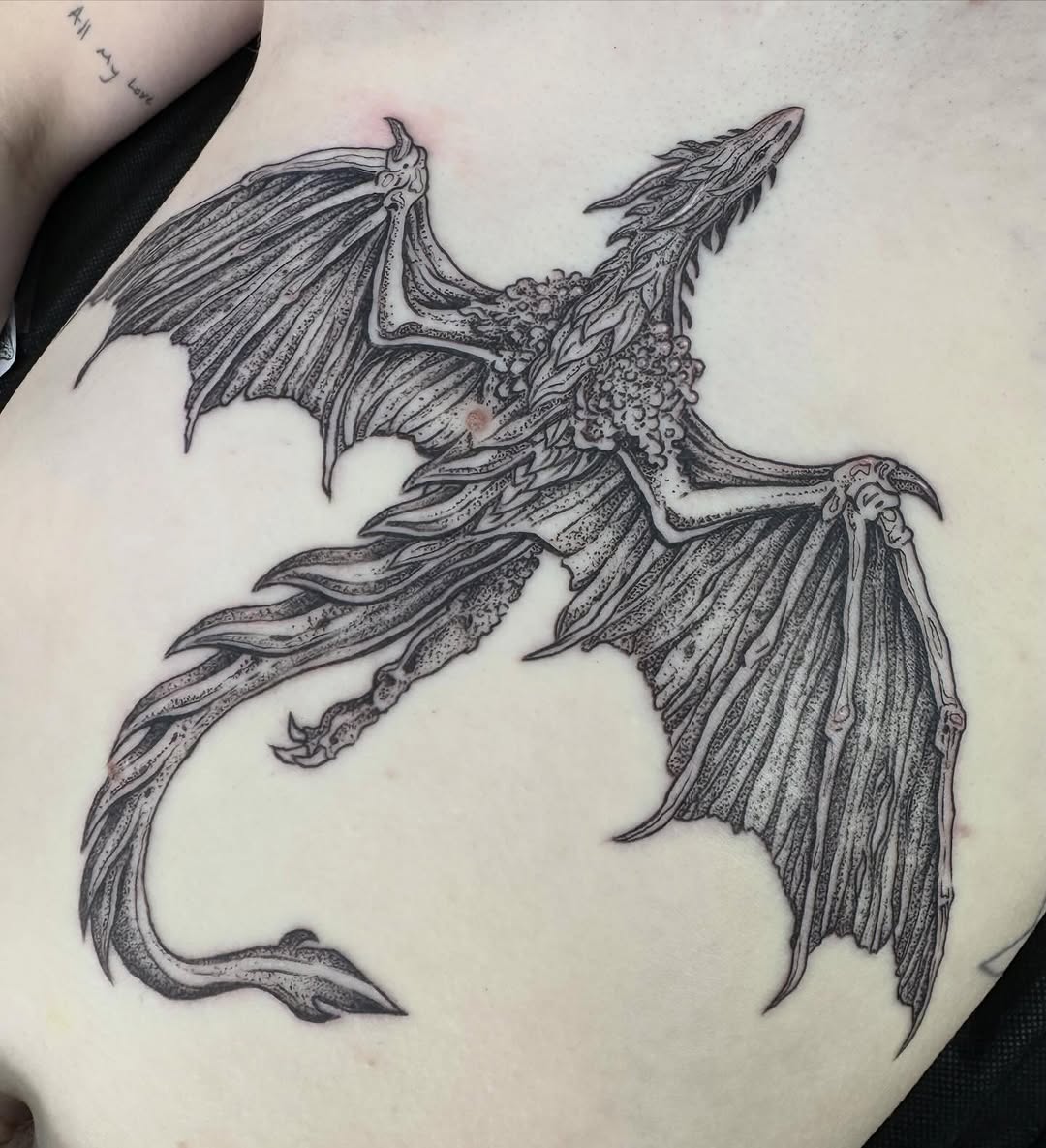 Tattoo by @writhingdirty — illustrative, dotwork