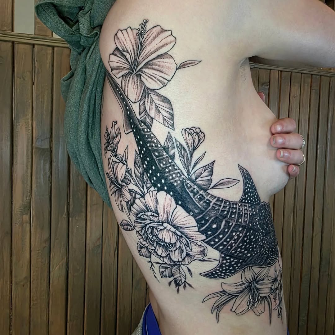 Tattoo by @ninas.tattoos_and.art — realism, black_and_grey