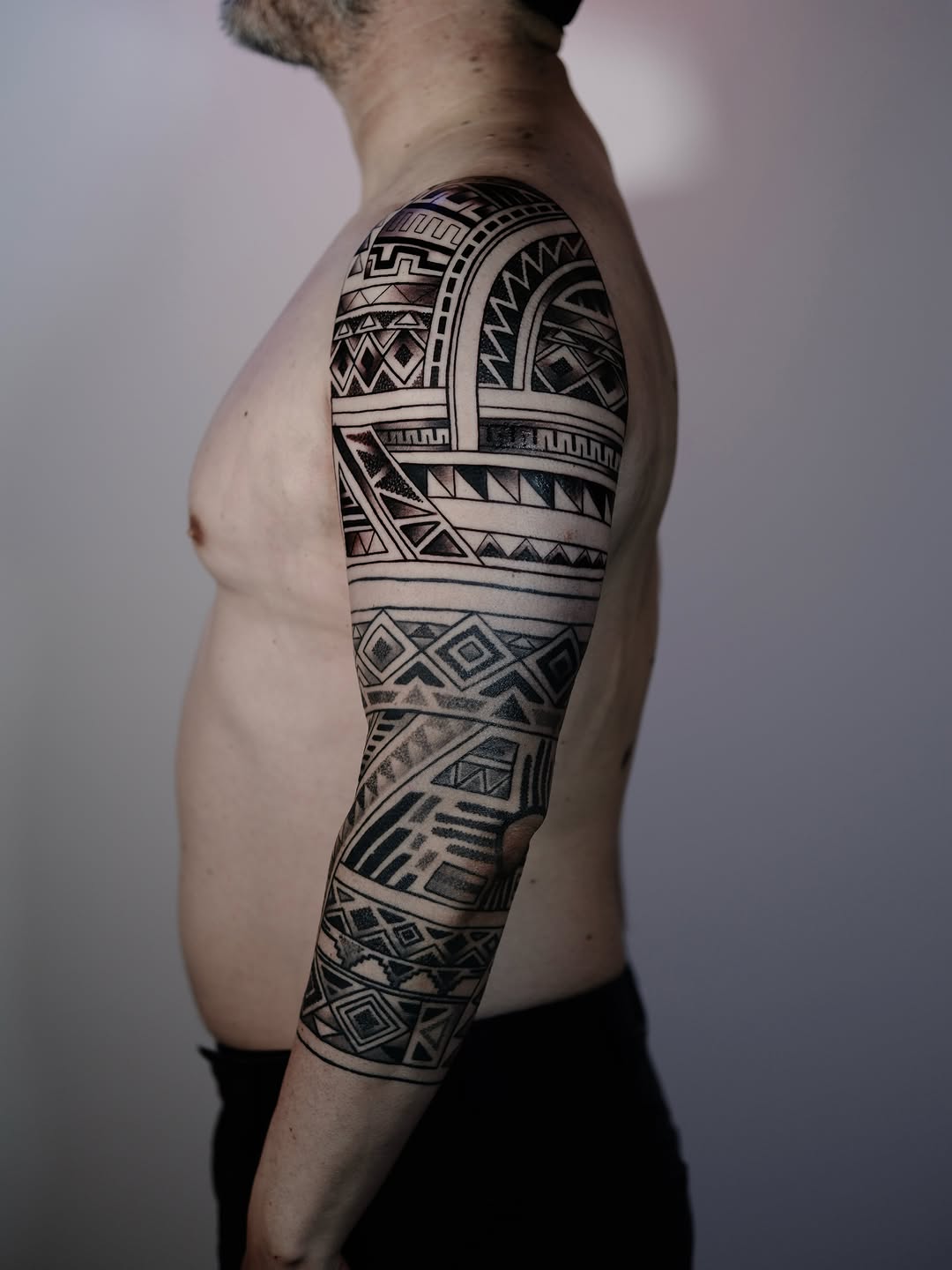 Tattoo by @ericharetattoo — tribal, black_and_grey