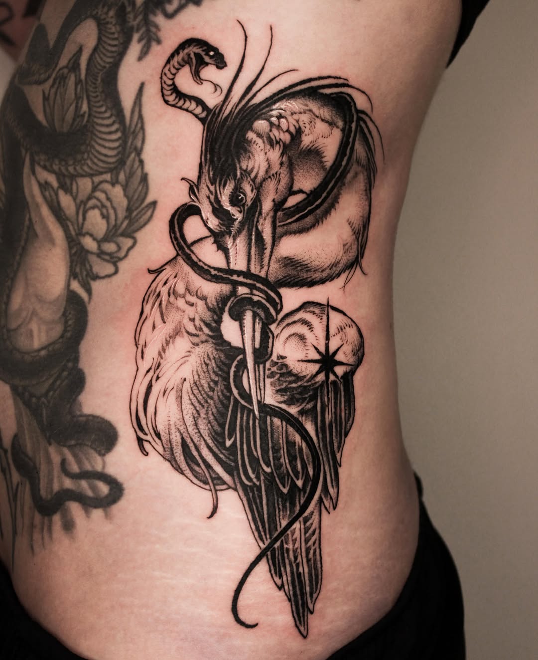 Tattoo by @wooleh__ — blackwork