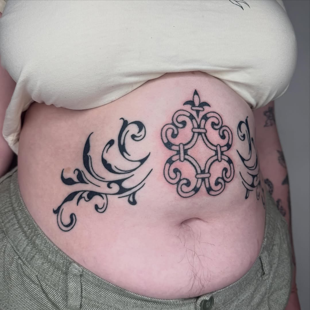 Tattoo by @microwave.00 — ornamental, blackwork