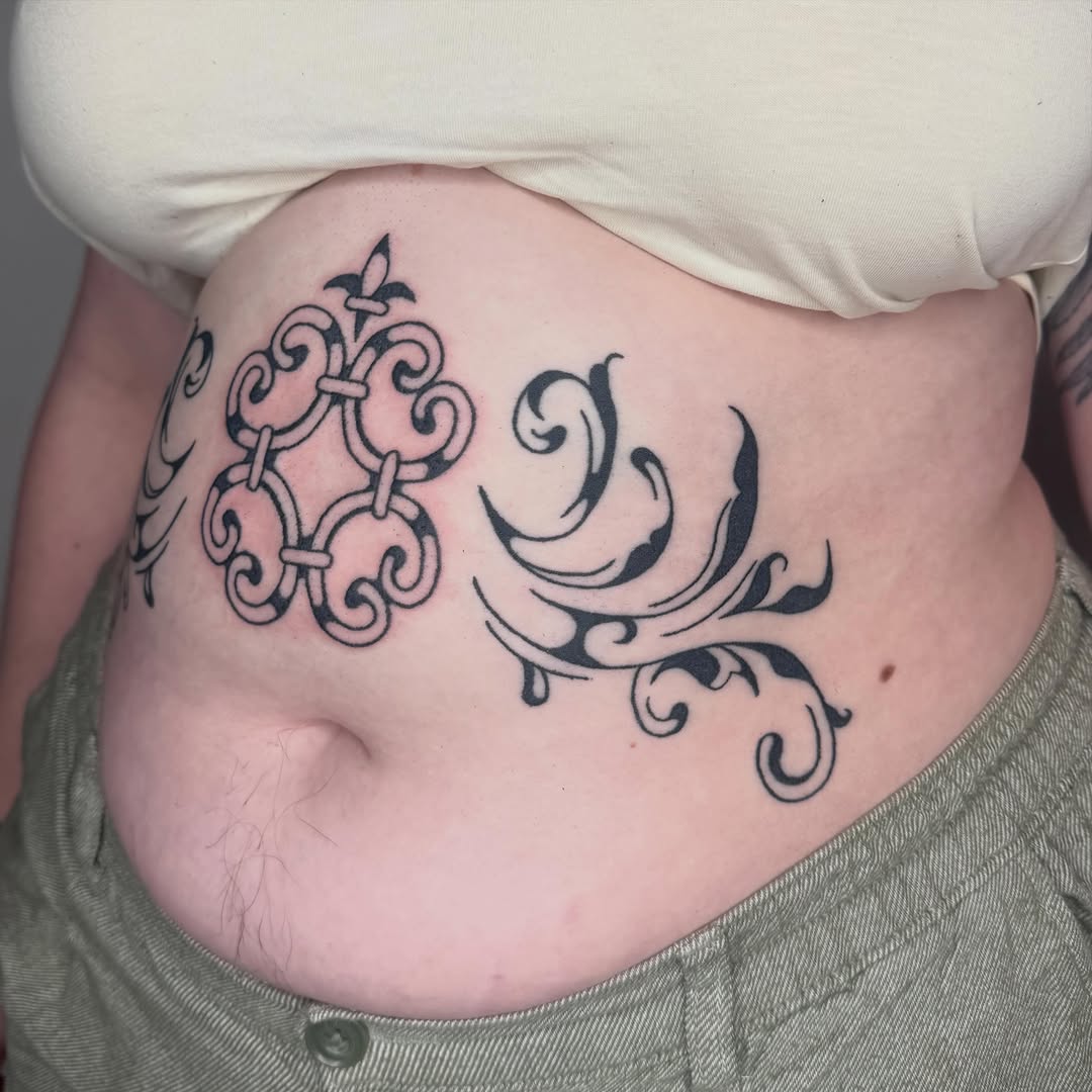 Tattoo by @microwave.00 — ornamental, blackwork