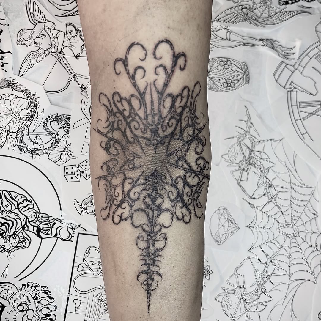 Tattoo by @loopytatz — ornamental, blackwork