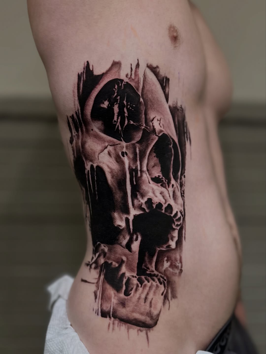 Tattoo by @dxmon.ttt โ realism, black_and_grey