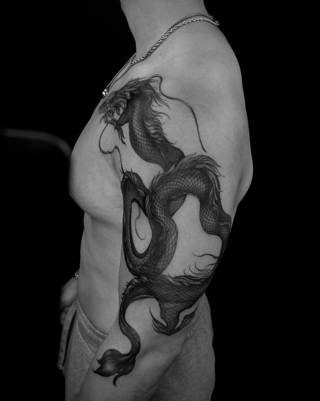 Tattoo by @wong_tattooer — black_and_grey, realism