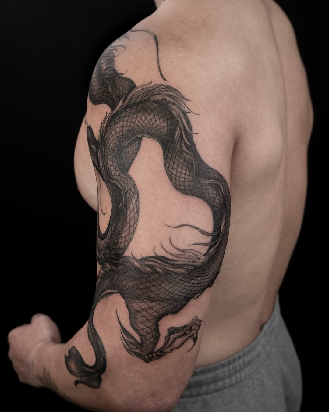Tattoo by @wong_tattooer — black_and_grey, realism
