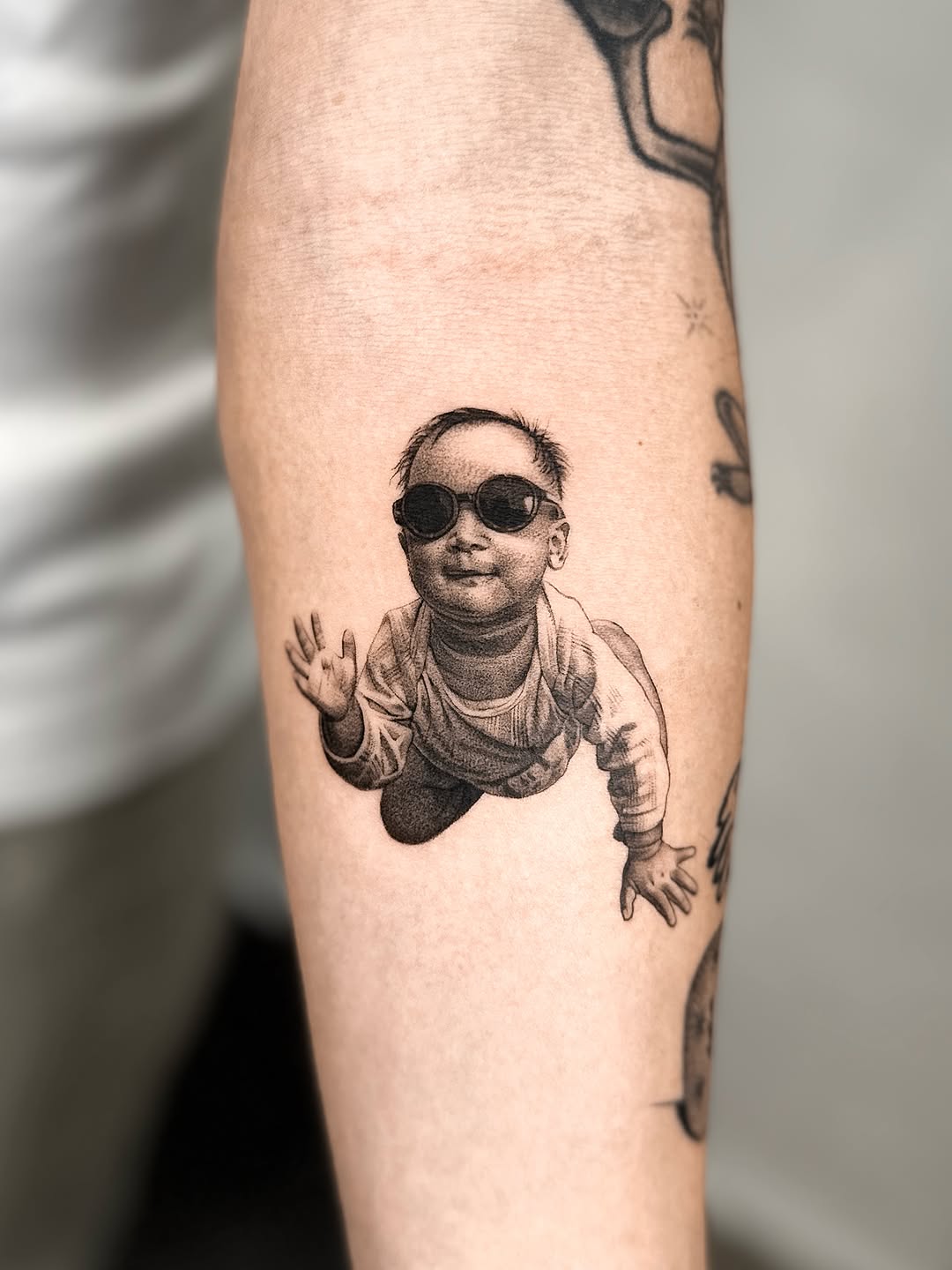 Tattoo by @_via_saru — realism, black_and_grey