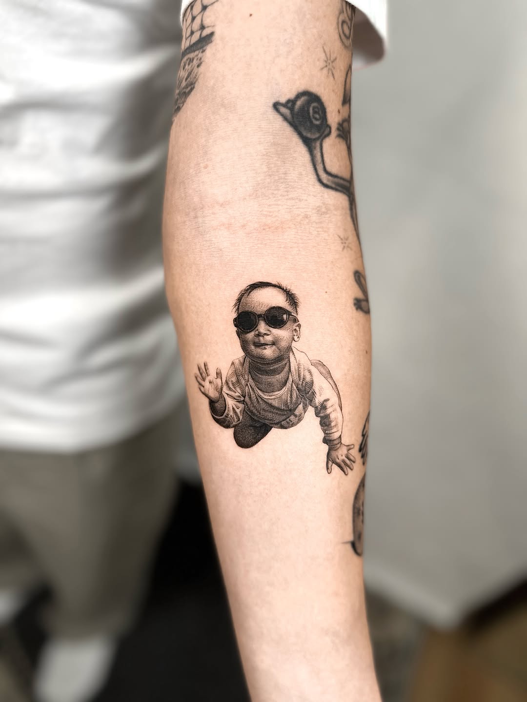Tattoo by @_via_saru — realism, black_and_grey