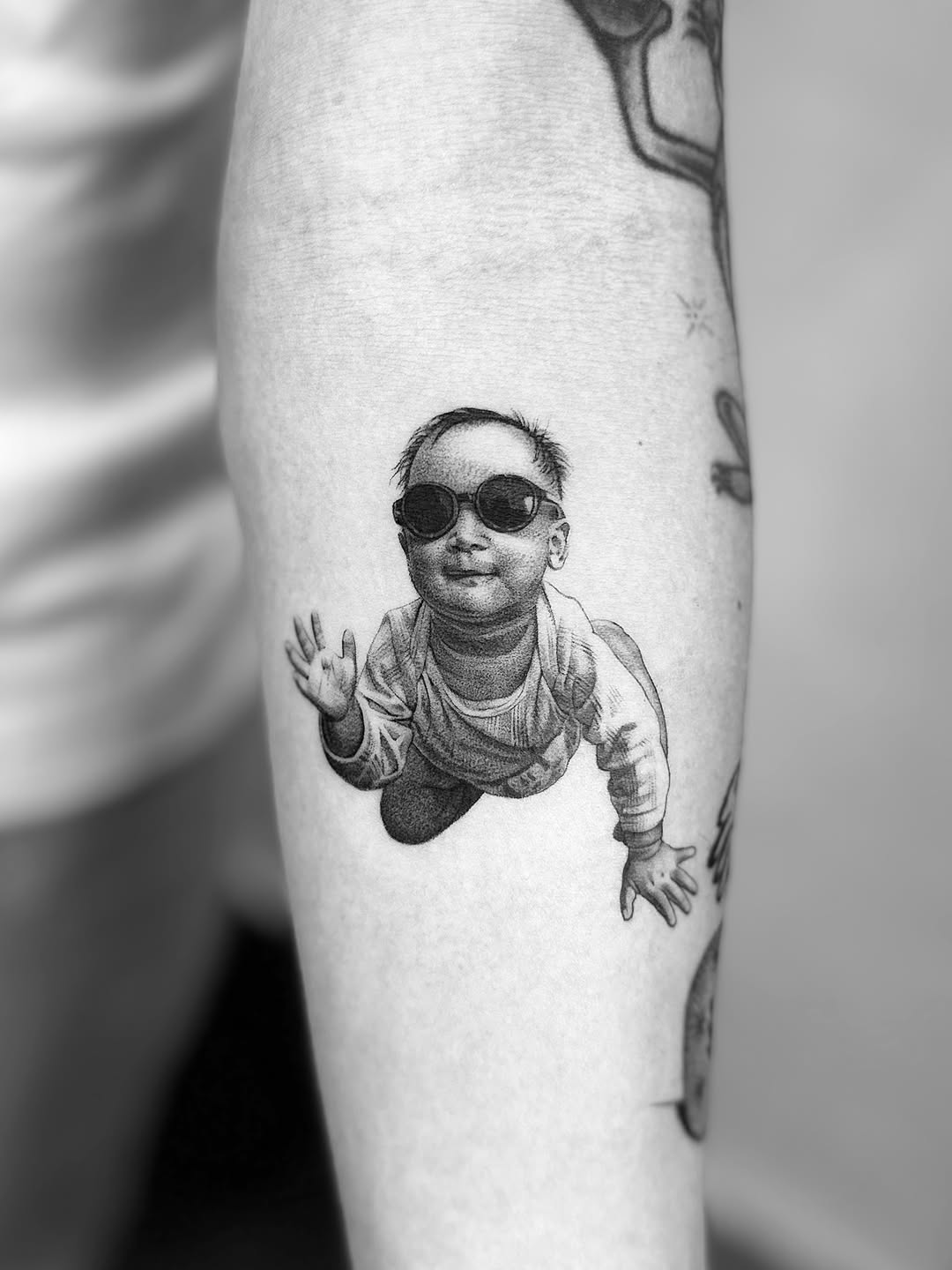 Tattoo by @_via_saru — realism, black_and_grey