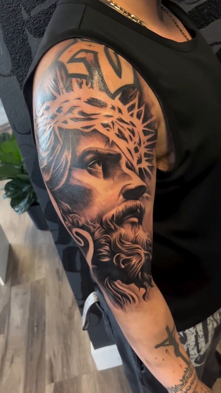 Tattoo by @sleepytattoo13 — realism, black_and_grey