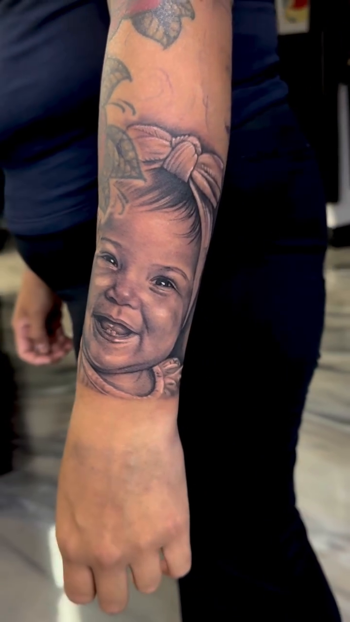 Tattoo by @rtk_tats — realism, black_and_grey